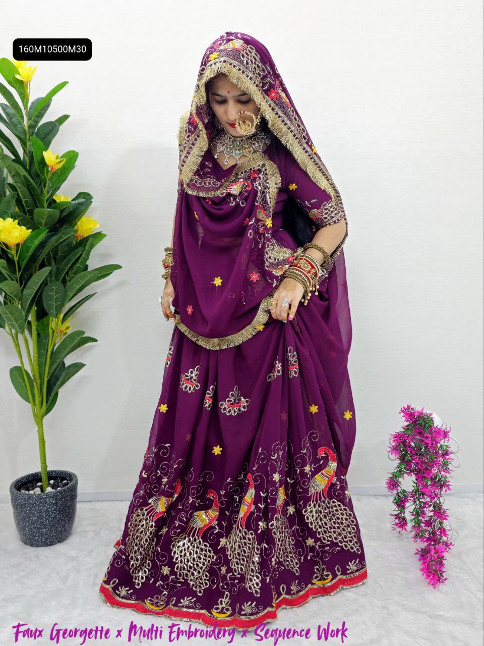 Model posing in TRENDBUY Wine Purple Georgette Lehenga Choli, full shot, featuring traditional jewelry, heavy embroidery, sequence work, and rich flair.