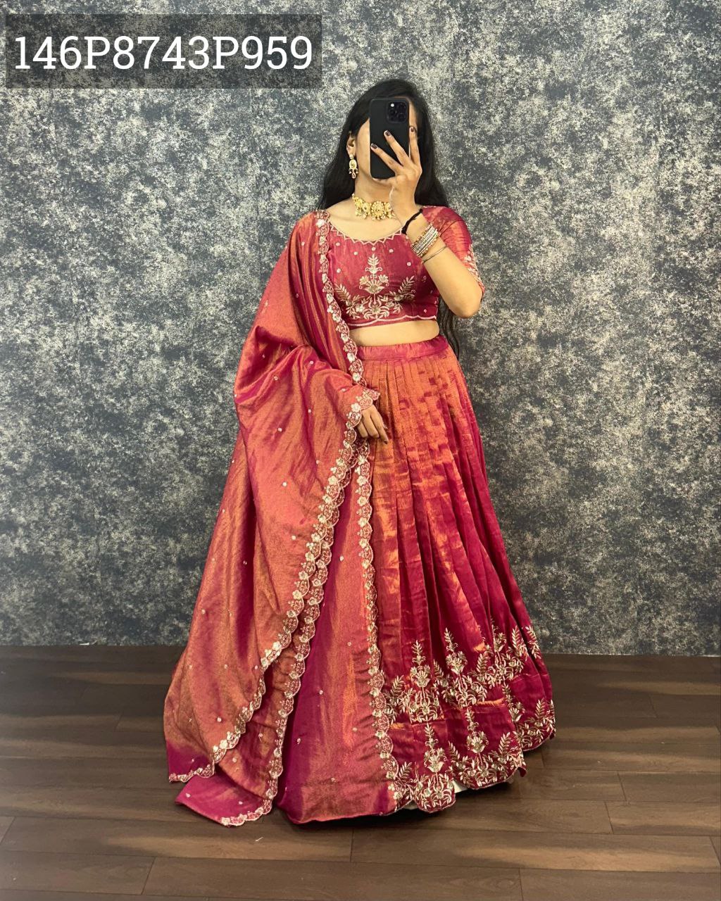 TRENDBUY Women's Red Tissue Silk Lehenga Choli with intricate Zari work and designer dupatta, full front view of model.