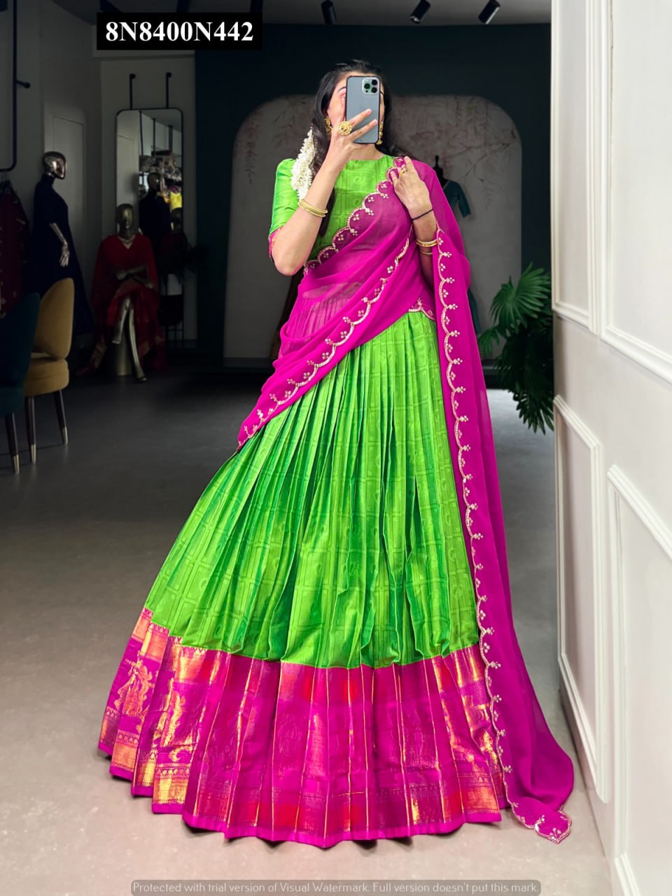 TRENDBUY Green Poly Cotton Zari Weaving Lehenga with vibrant Pink Georgette Sequins Dupatta on model, full body shot.