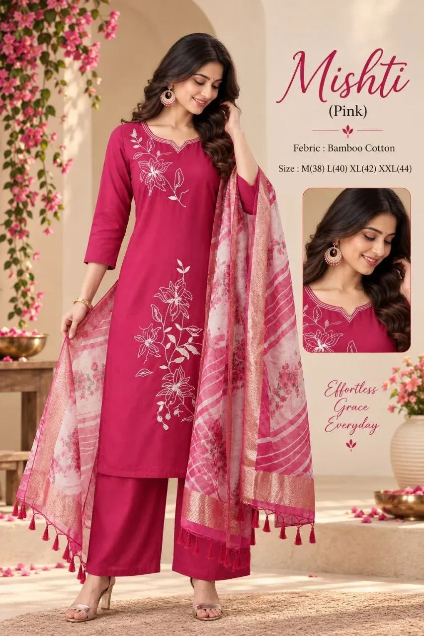 Model wearing pink bamboo cotton suit set with floral embroidery and printed dupatta