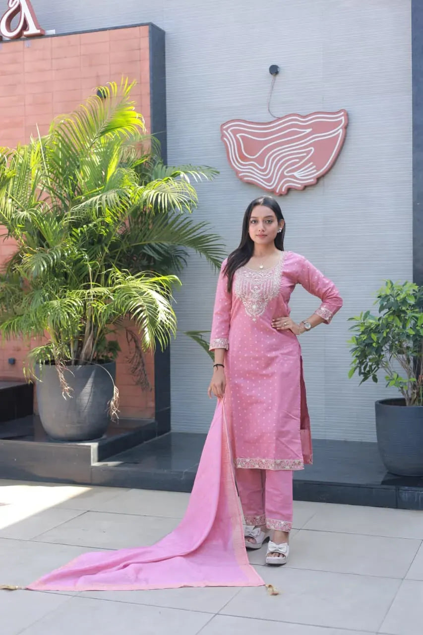 Model wearing baby pink chanderi cotton kurti set with dupatta outdoors