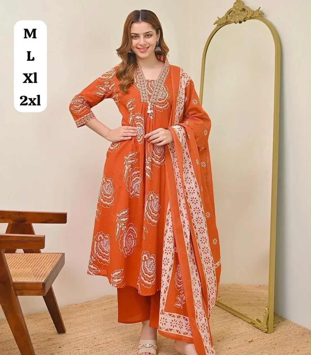 Model wearing orange printed cotton kurti with matching dupatta and pants