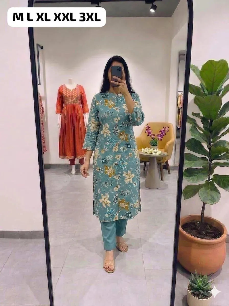 Model wearing sea green floral print cotton kurti pant set