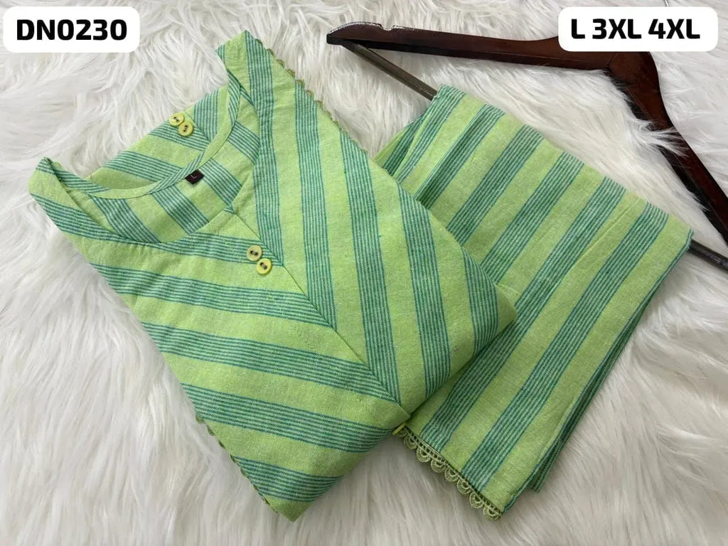 Green striped cotton kurti and pants set laid flat on white faux fur background