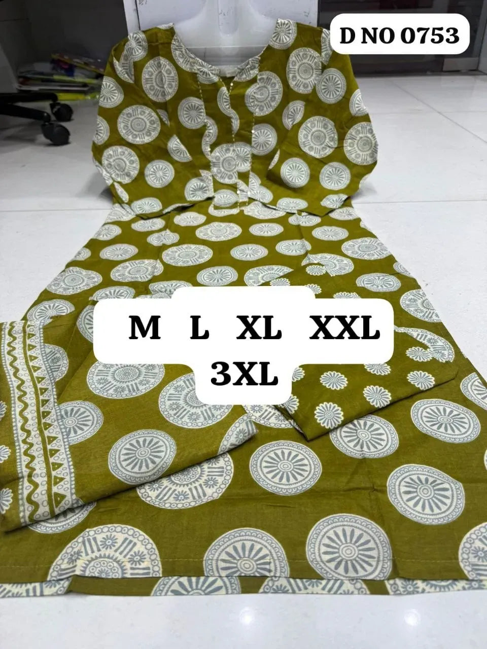 Olive green cotton kurti set with white circular print laid flat