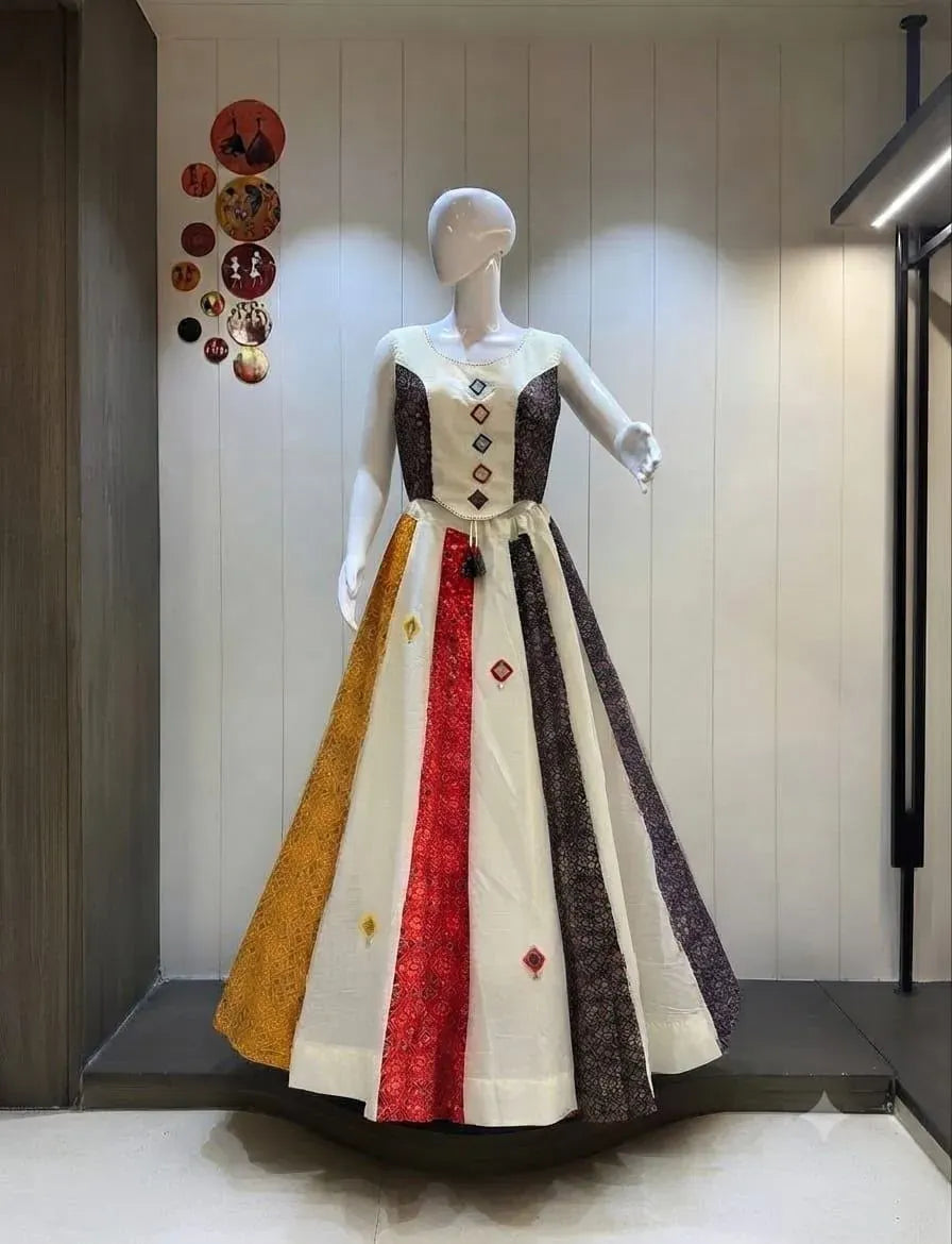 White and multi-color Ajrakh cotton lehenga choli displayed on a mannequin