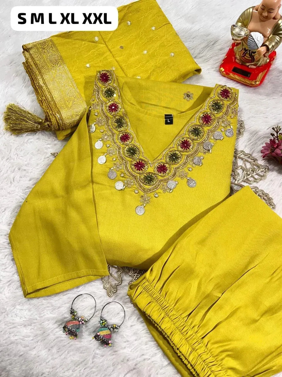 Yellow straight kurti set with heavy embroidered neckline and coin latkans
