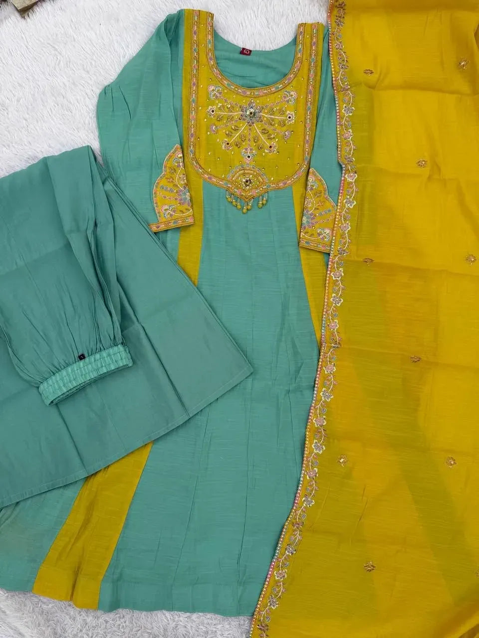 Teal and yellow chanderi anarkali kurti set with dupatta flat lay