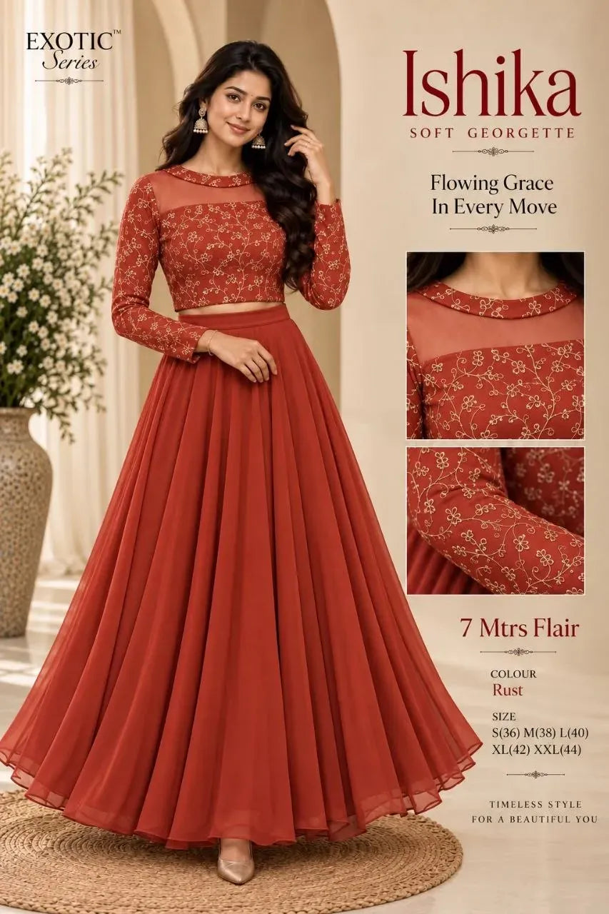 Model wearing rust georgette lehenga set with gold embroidery