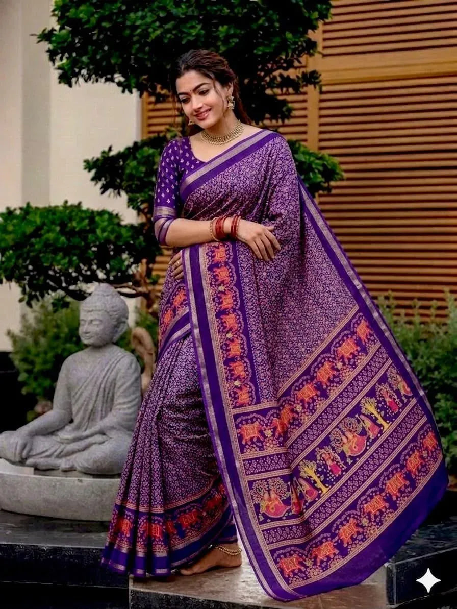 Model wearing purple georgette saree standing outdoors