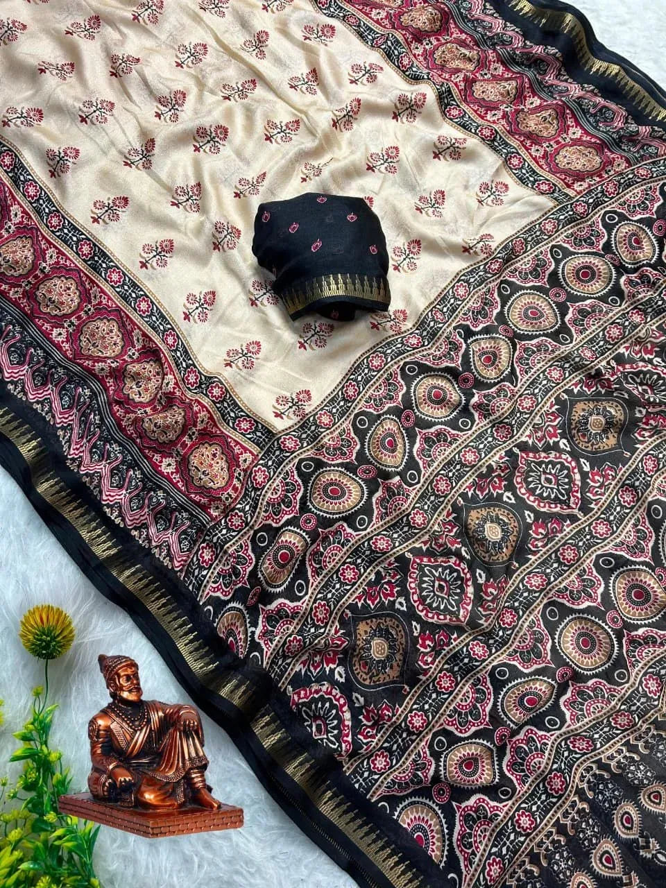 Cream and black ajrakh print marshmallow saree with matching blouse piece
