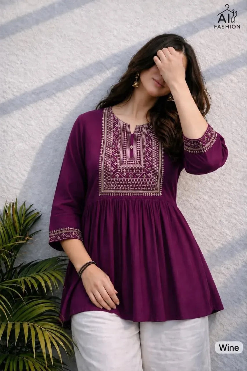 Wine heavy rayon short tunic with embroidery on model