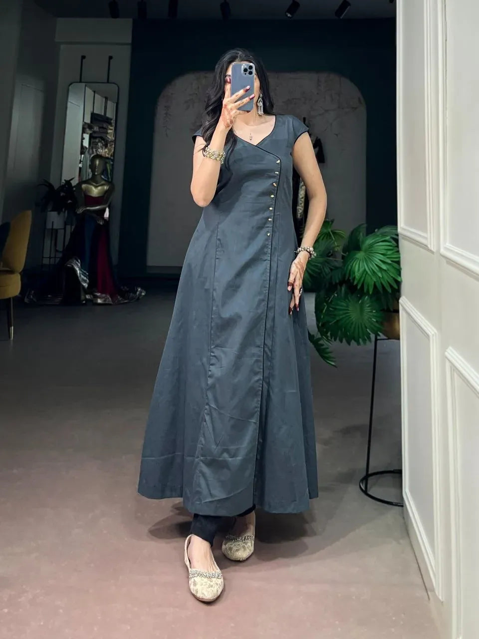 Woman wearing dark grey khadi cotton kurti with side button detailing