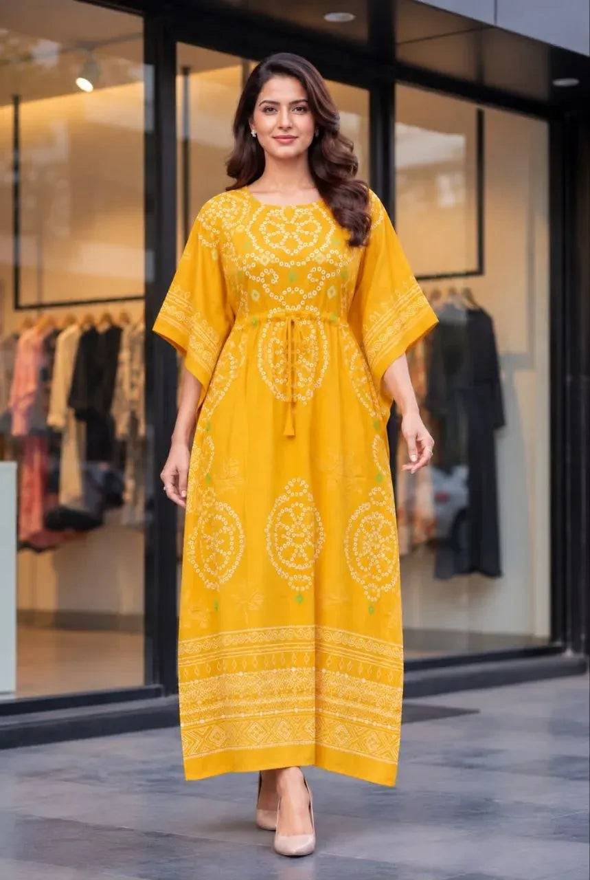 Model wearing yellow printed heavy crape kaftan dress