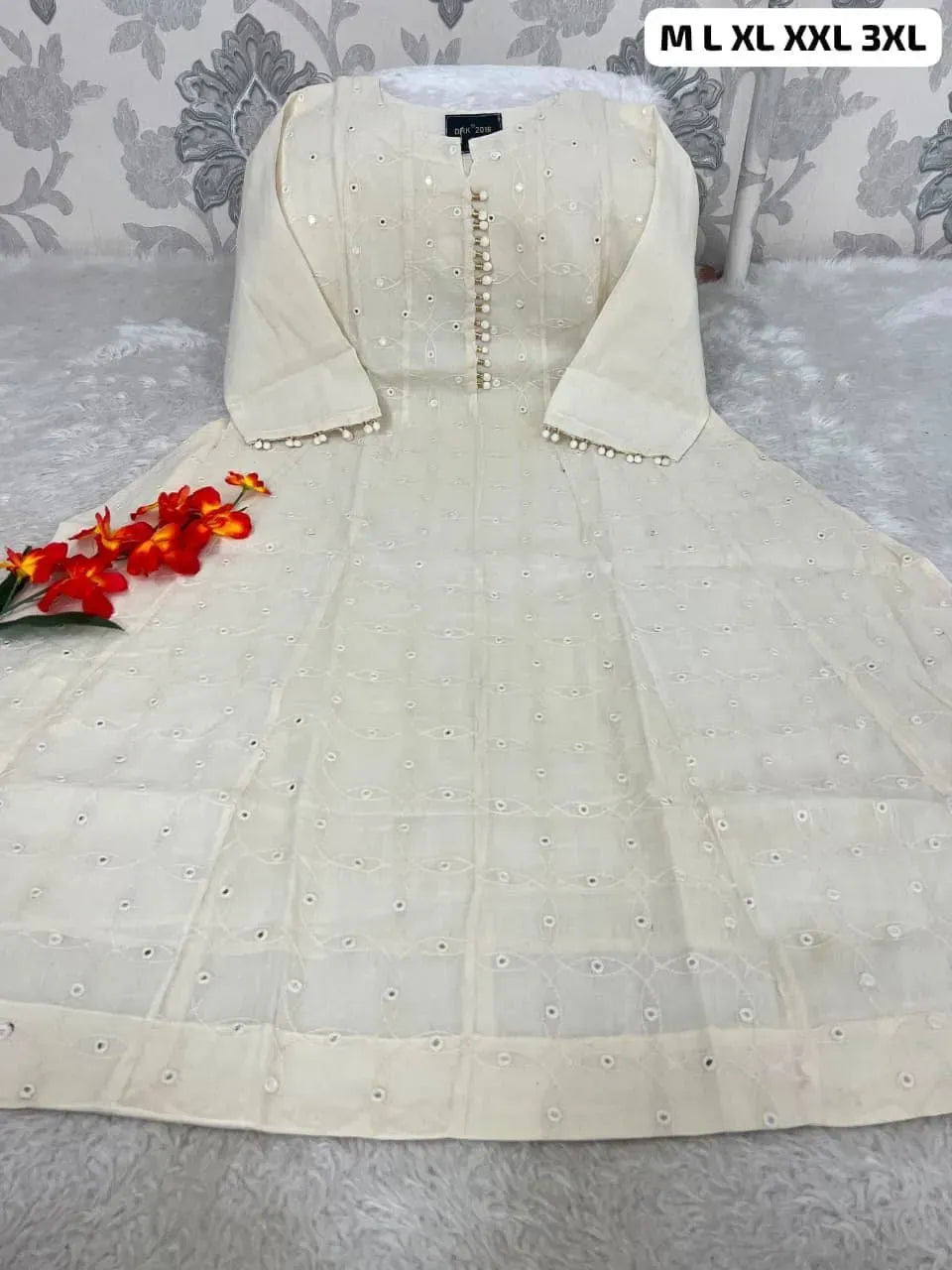 White pure cotton chikankari anarkali kurti flat lay with red flowers