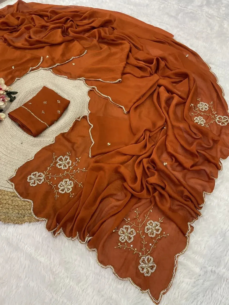 Rust orange Rangoli crushed saree with hand cutdana floral border