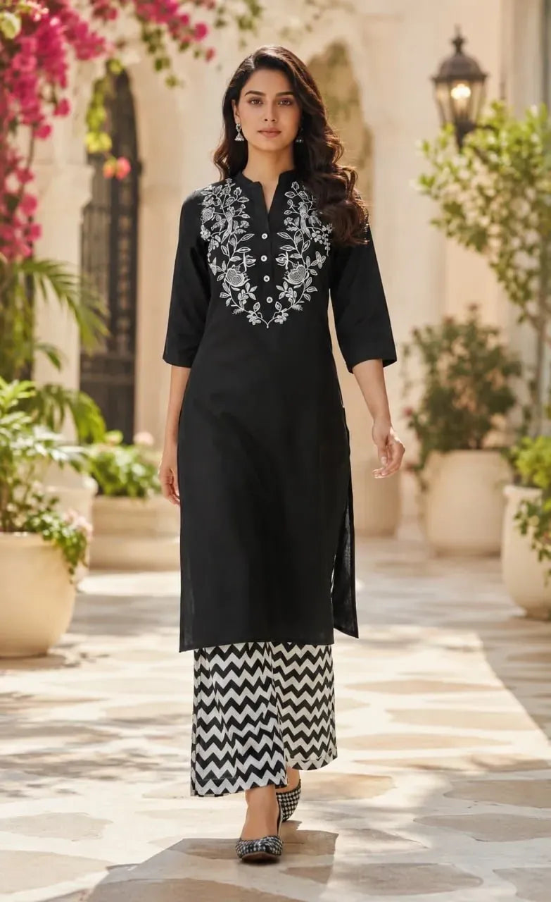 Model wearing black embroidered rayon kurti with zig zag palazzo front view