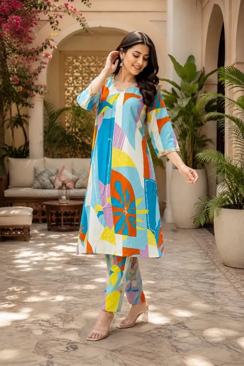Model wearing colorful printed rayon slub kurti and pant set outdoors