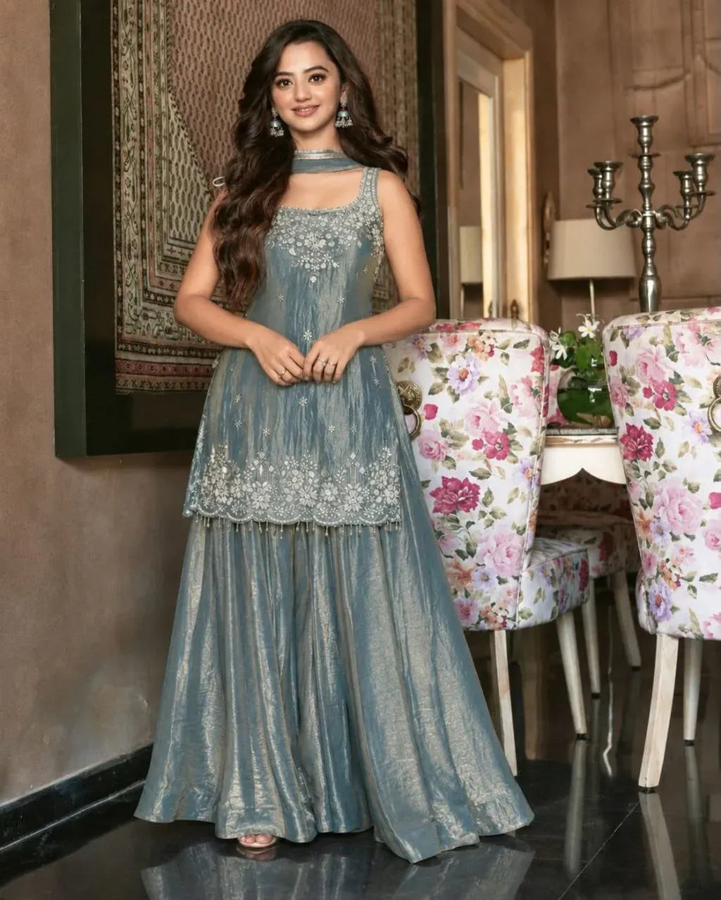 Model wearing grey embroidery silk kurti and palazzo set indoors