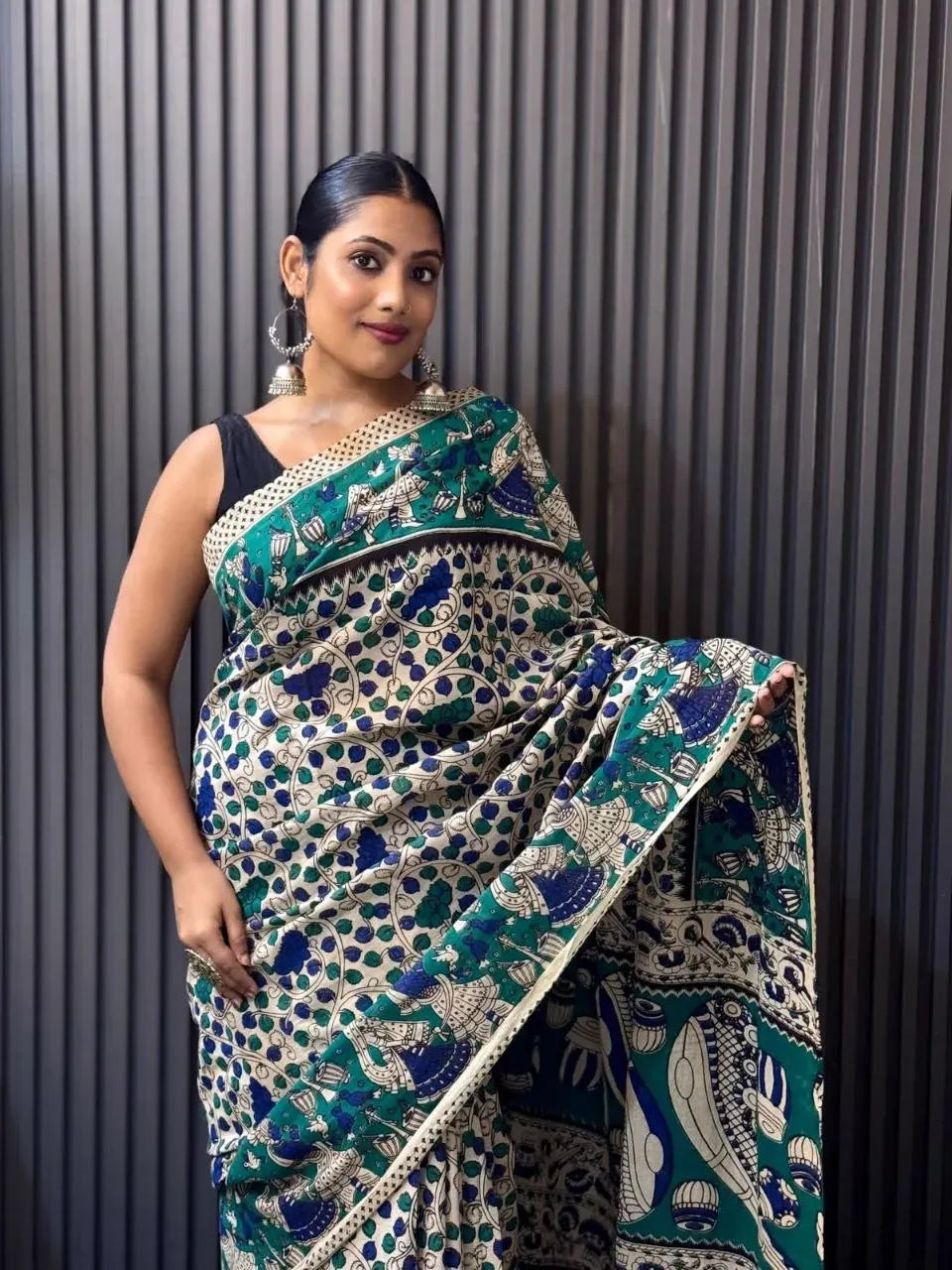 Model wearing green and blue digital print soft linen saree