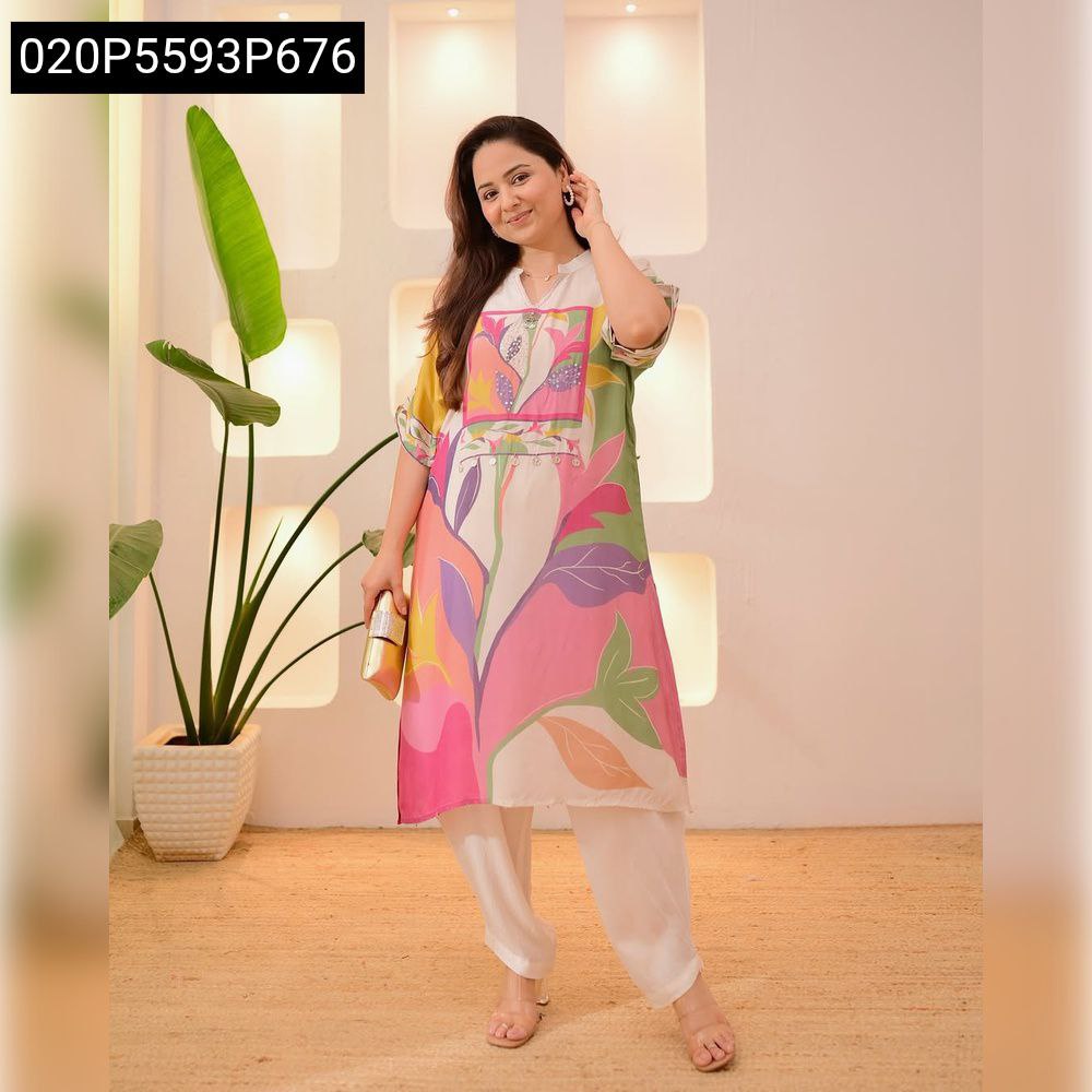 Smiling woman in a vibrant pink multi-color digital print women's kurta set, perfect for festive wear.