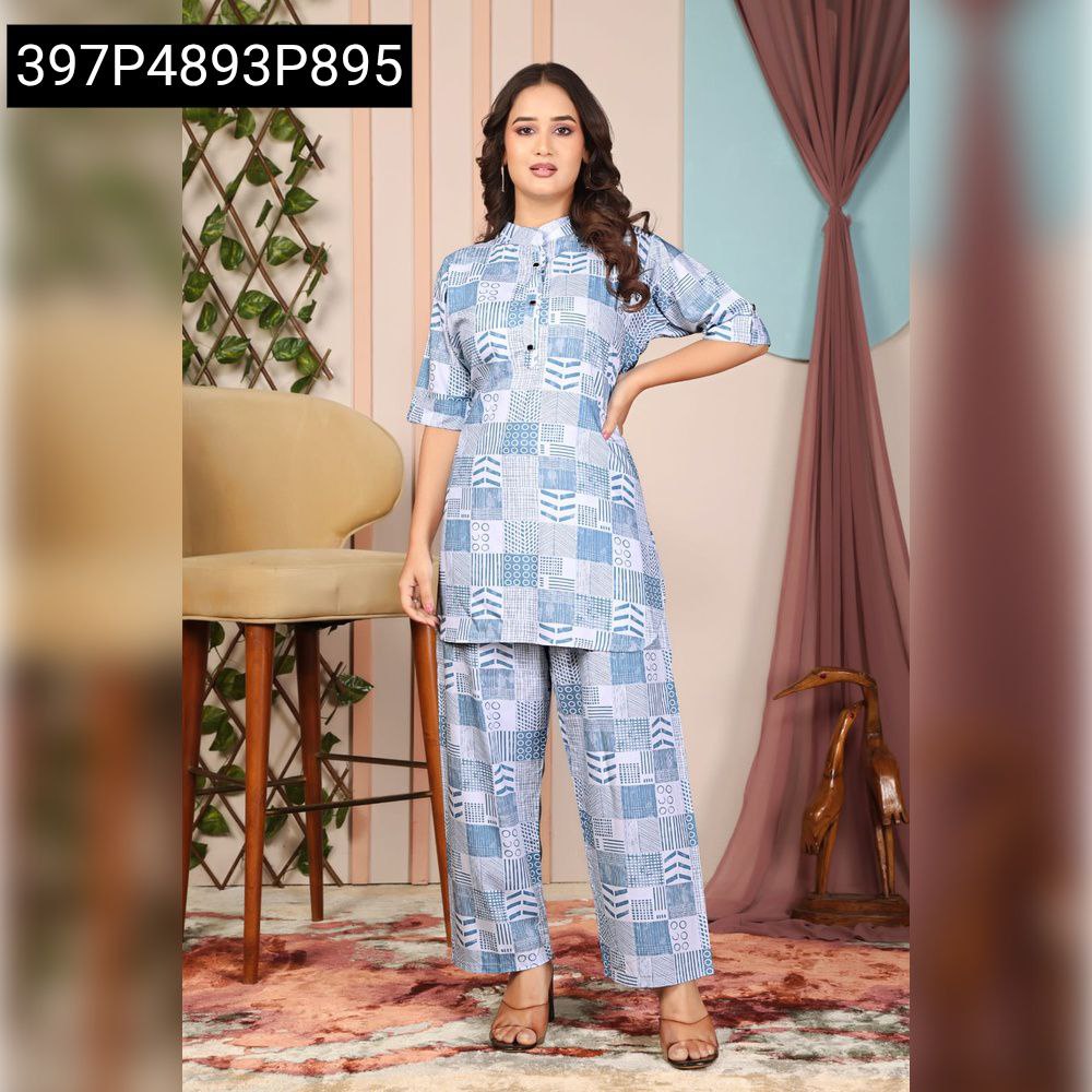 Blue and white geometric print rayon palazzo set on a model.