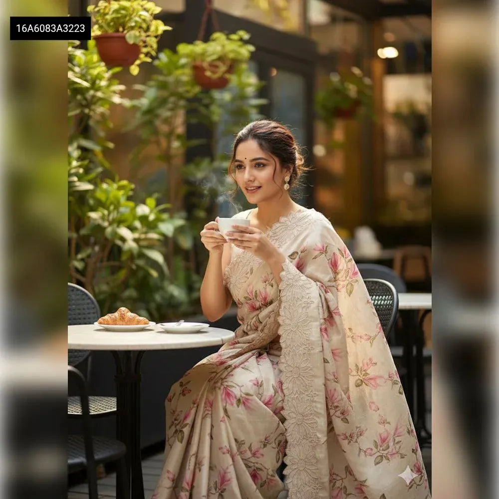 Model wearing TRENDBUY Pure Tussar Silk Saree, looking at the camera, highlighting the sophisticated cutwork border and floral pattern.