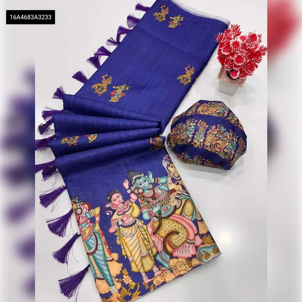 Royal Blue Handloom Tussar Silk Kalamkari Digital Print Saree with matching printed blouse, folded neatly on a white background with decorative items.