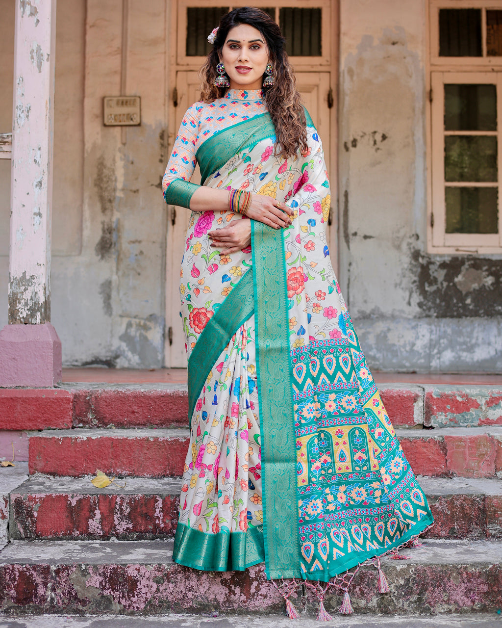Woman posing in an elegant TRENDBUY Ivory Green Multicolor Floral Tussar Silk Saree with zari border and matching blouse