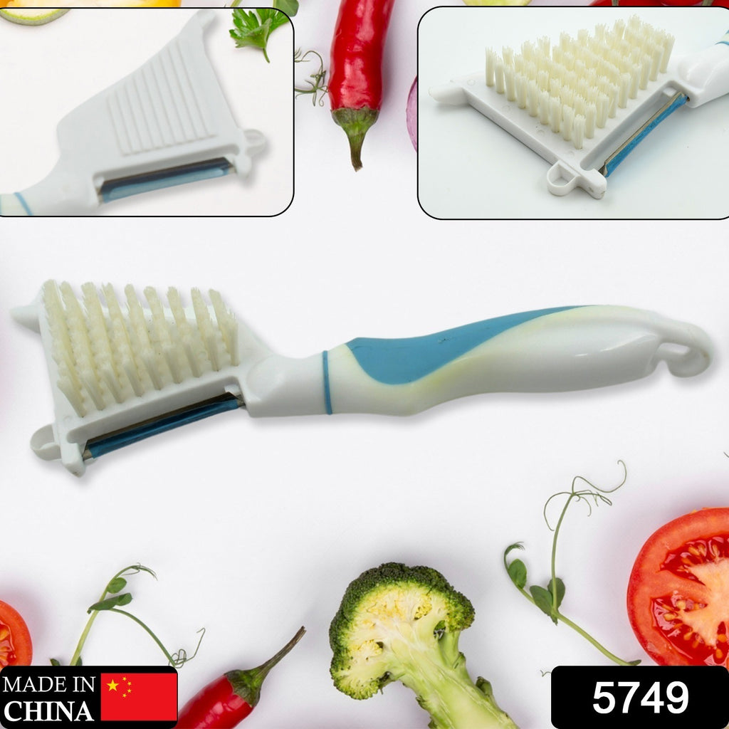 Green multipurpose peeler with built-in brush for easy fruit and vegetable peeling and cleaning