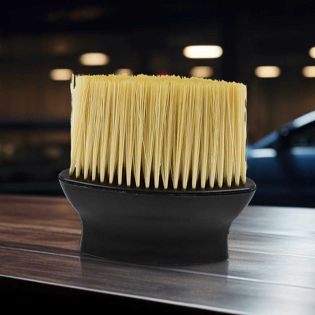 Close-up of dense yellow synthetic bristles on a black handle