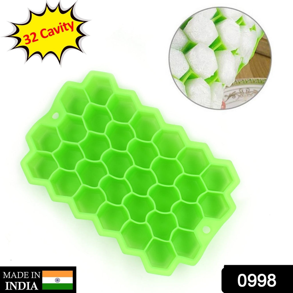 Multi-color 32-cavity silicone ice cube trays, shown ready to freeze and easily release ice.