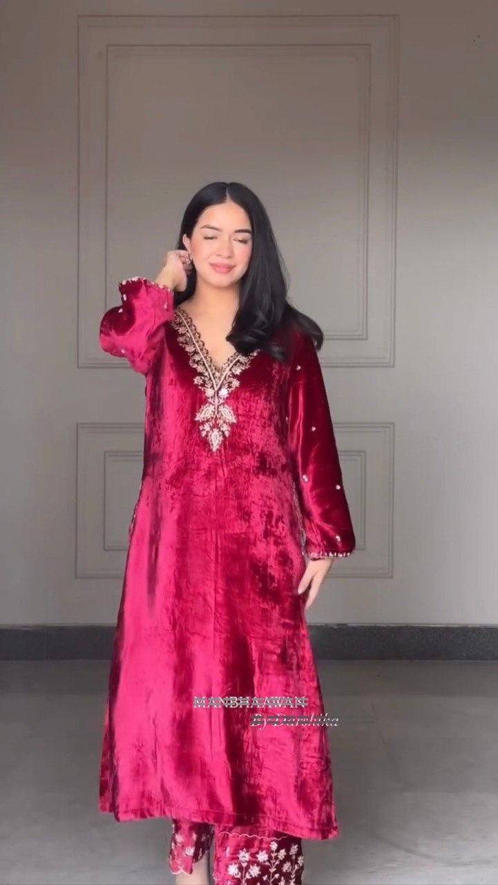Woman posing in a stunning Wine Red Velvet Embroidered 3-Piece Suit, showcasing the luxurious fabric and intricate detailing.