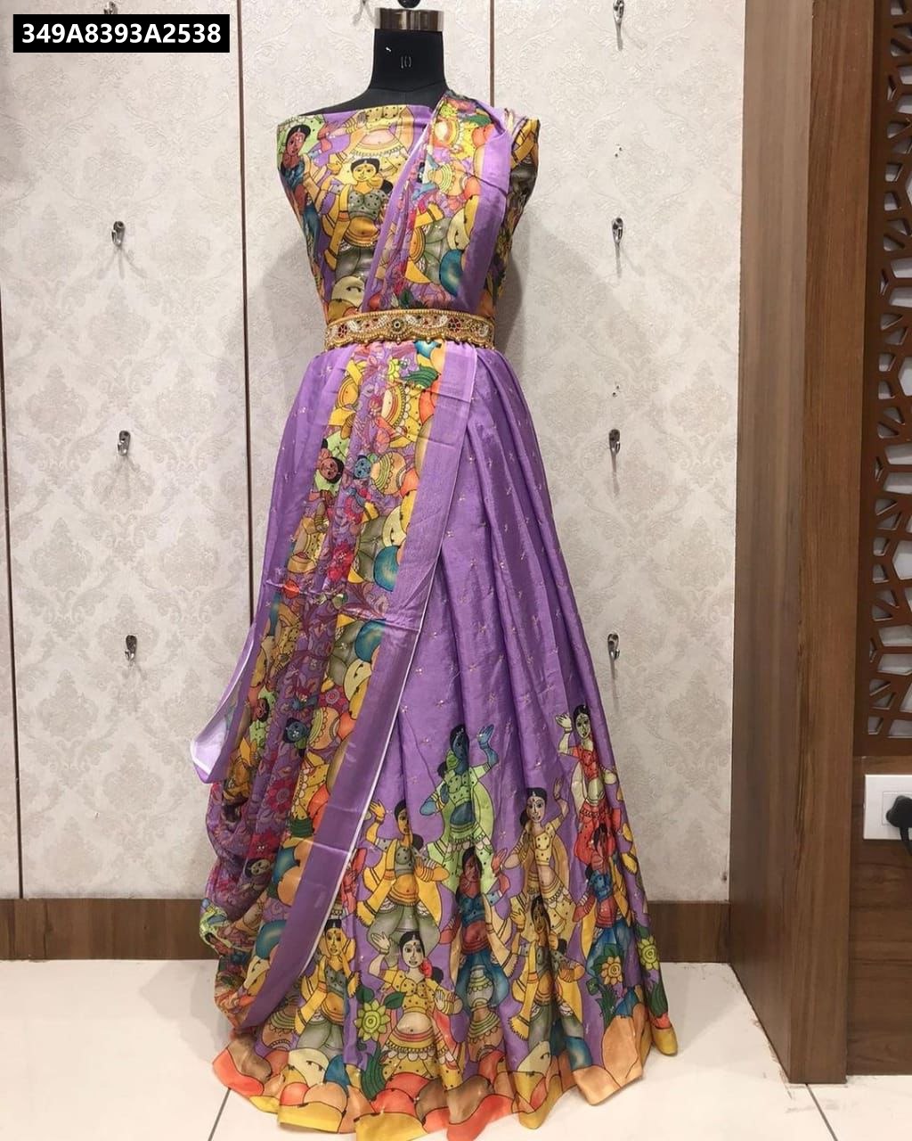 Front view of Lavender Ajanta Print Chinnon Silk Lehenga set on a mannequin with Mukaish work.