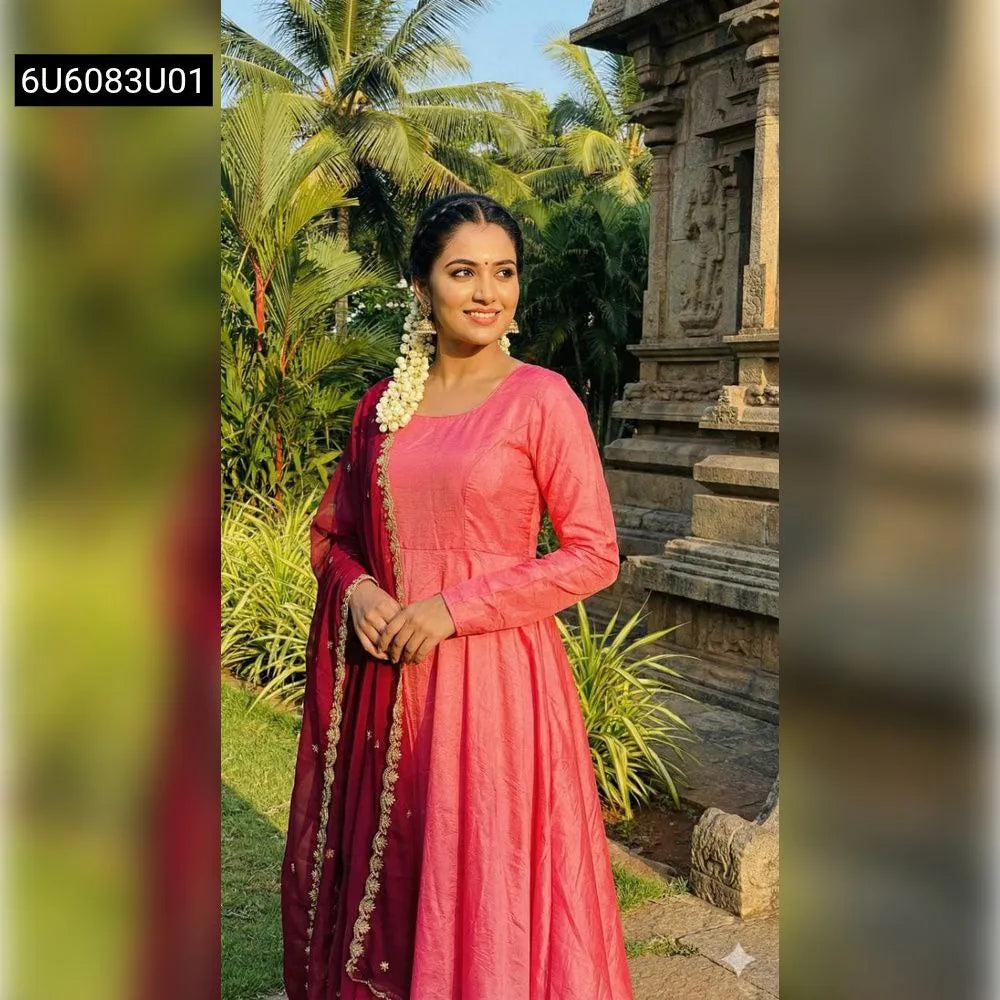 TRENDBUY Vichitra Silk Anarkali Gown in Rose Pink with Maroon Dupatta worn by a model in a garden setting, looking elegant