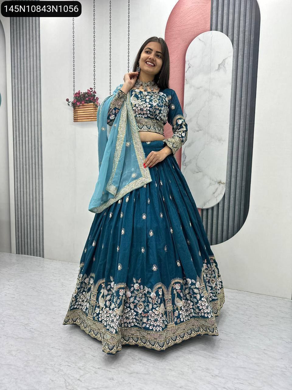 TRENDBUY Teal Blue Vichitra Silk Embroidered Lehenga Choli for Women (Model Front View)