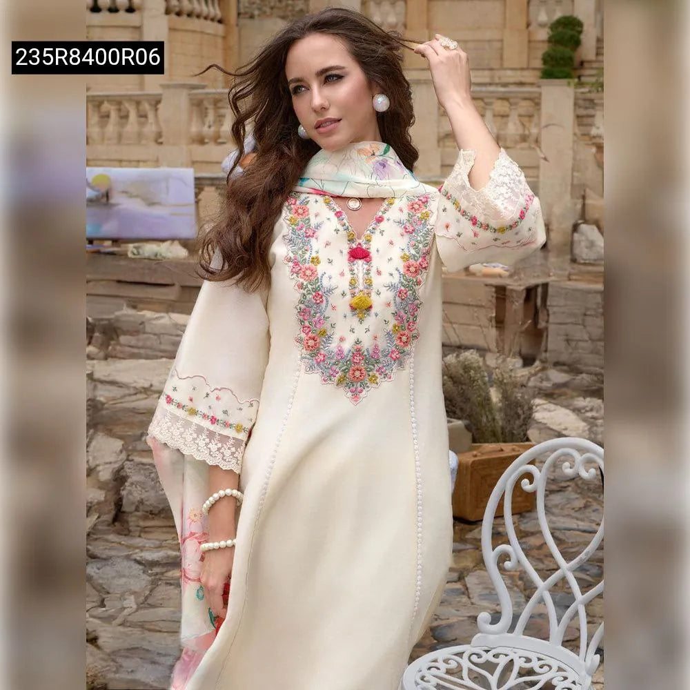Model wearing Cream Viscose Chanderi Kurta Set with sequence embroidery and floral dupatta