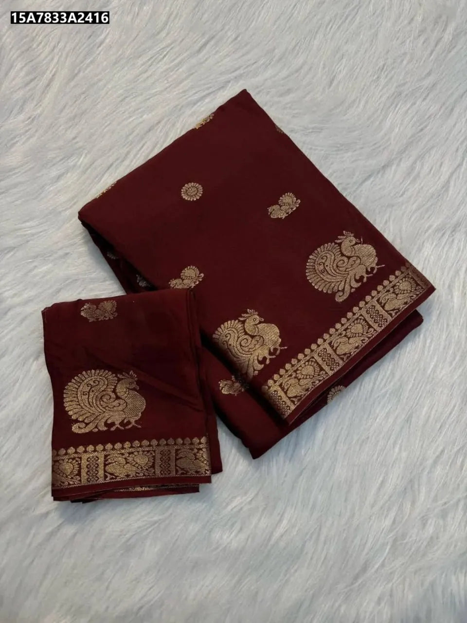 Maroon Viscose Crepe Silk Saree with golden peacock motif border and running blouse