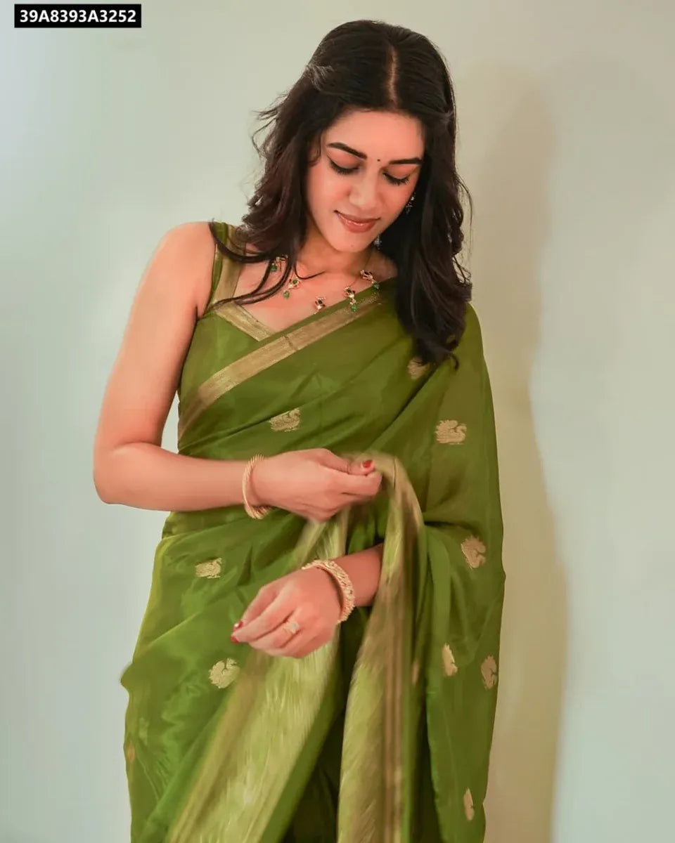 Model wearing TRENDBUY Olive Green Pure Soft Viscose Crepe Silk Saree with Jacquard Peacock Design