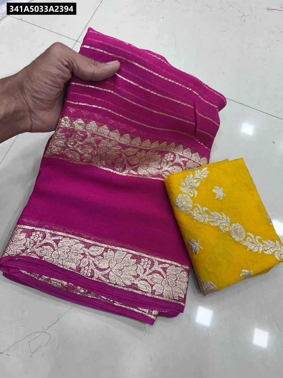 Vibrant Pink Viscose Georgette Saree with Yellow Dola Banarasi Silk Contrast Blouse from TRENDBUY