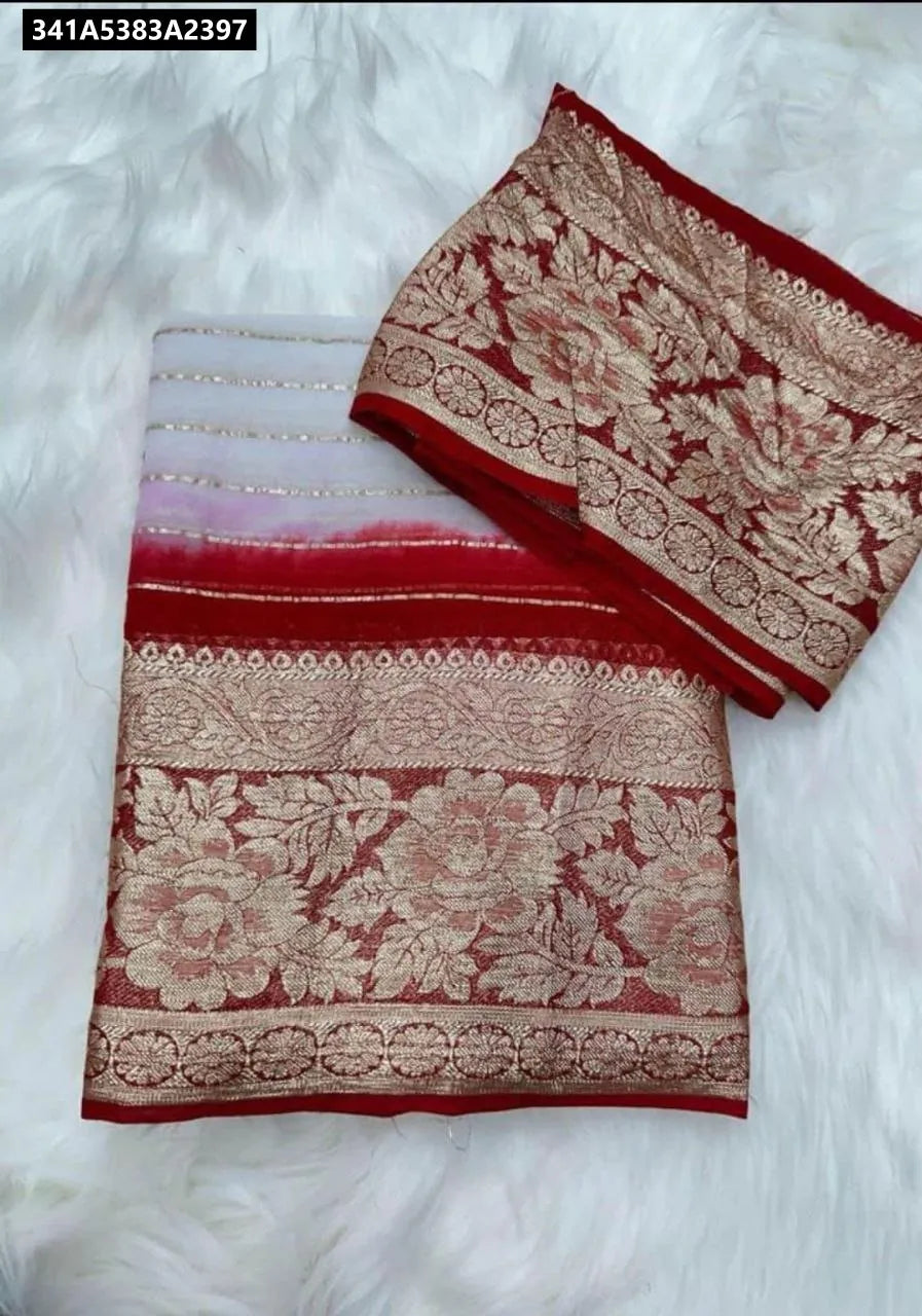 Flat lay of red and white Viscose Georgette Saree with contrast golden zari border and matching blouse
