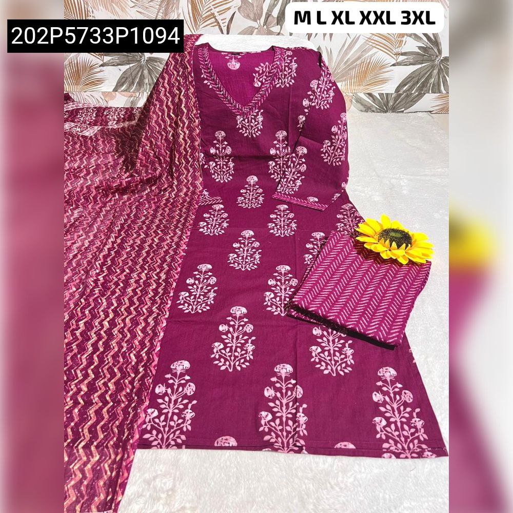 Fuchsia cotton kurta set with sequence work, full set laid out, with patterned pant and dupatta on a patterned background.