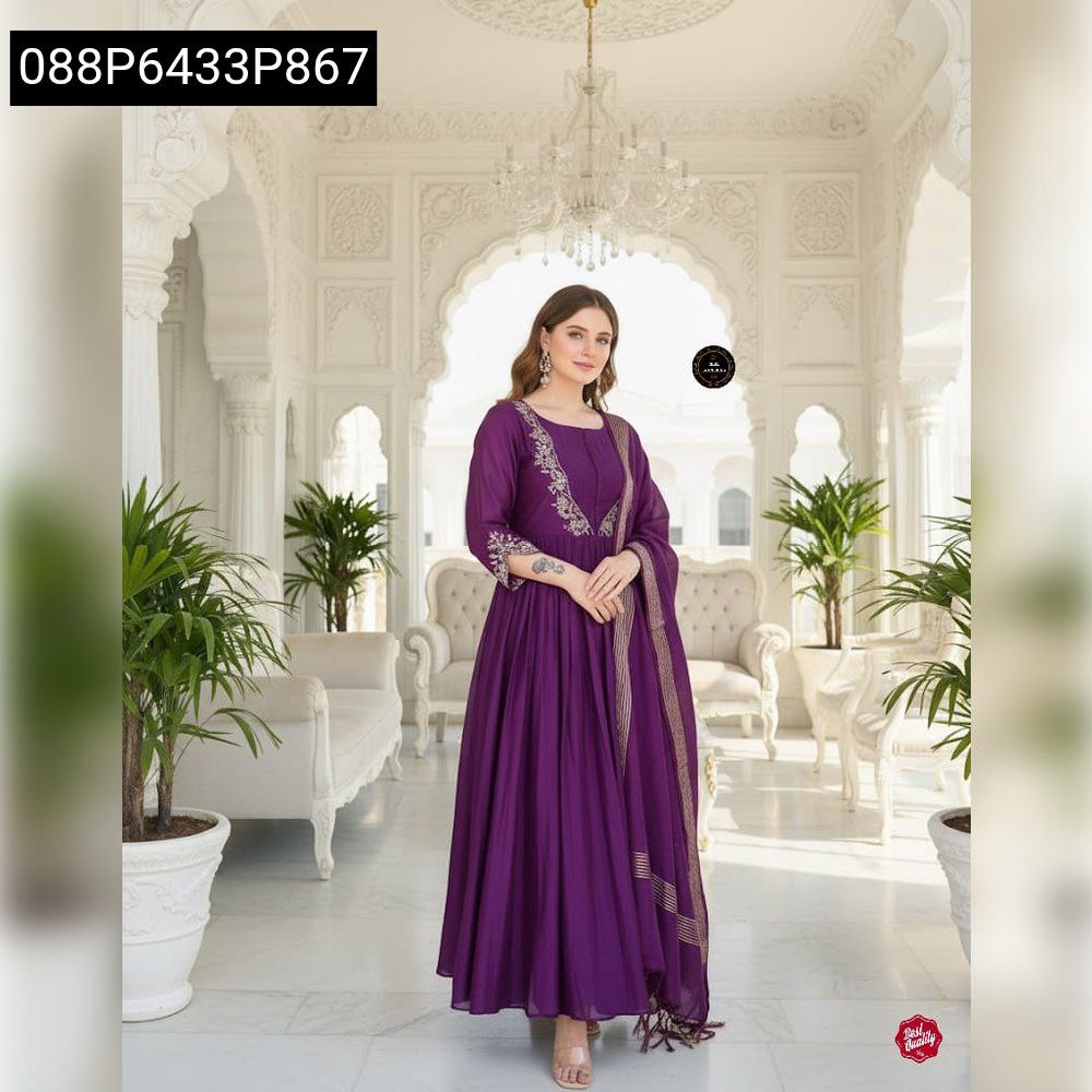 Front view of woman in elegant purple embroidered Chinnon Anarkali kurti set with dupatta, posing confidently.