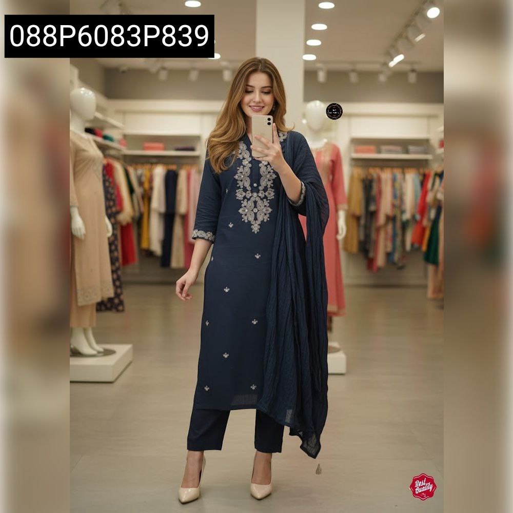 Stunning model showcasing Navy Blue Embroidered Rayon Slub Kurti Set with Chanderi Dupatta, front pose in a stylish boutique.