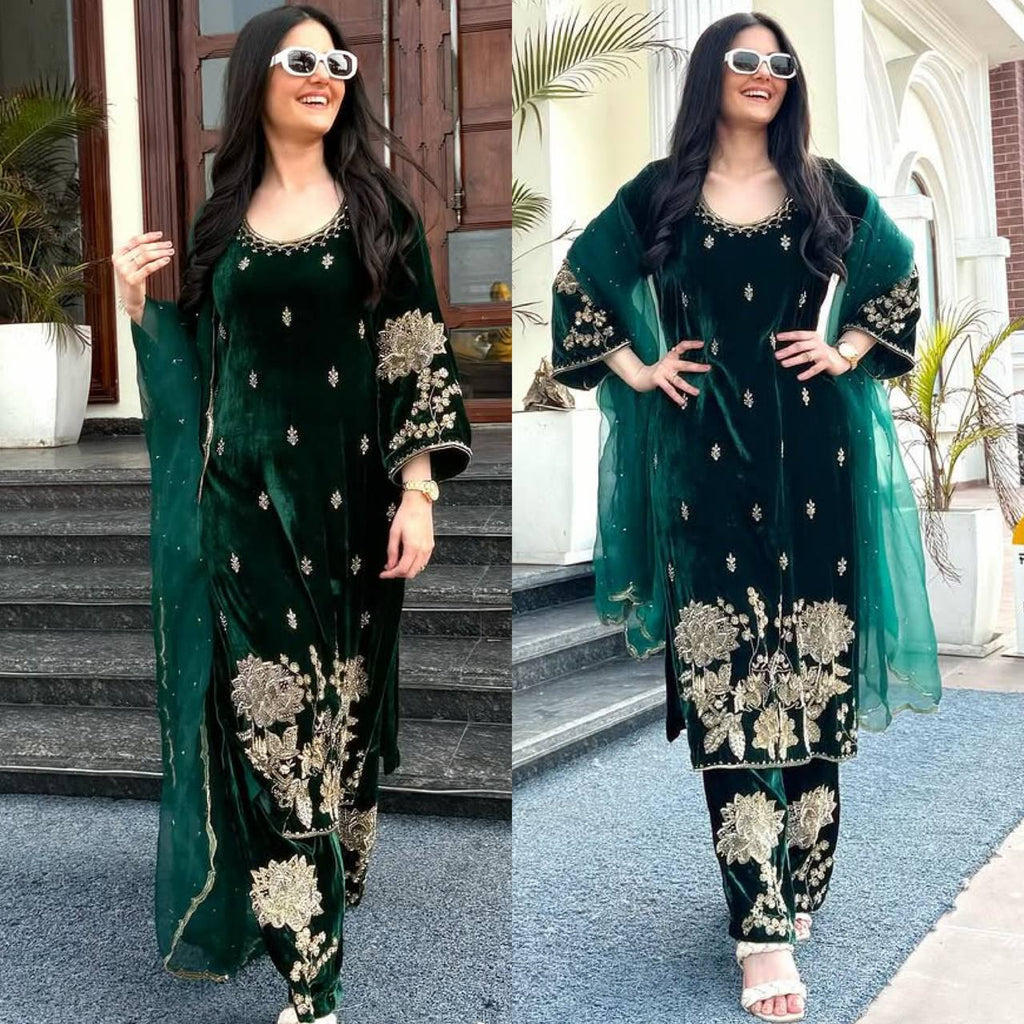 Composite of model in dark green velvet suit with embroidery, smiling (front and side views).