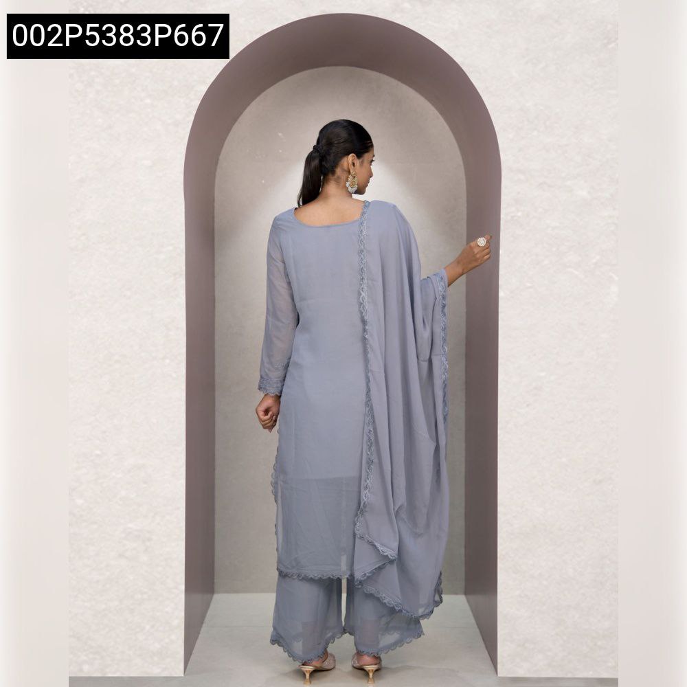 Woman posing in Lavender Grey Faux Georgette Chikankari Gown Set with dupatta, elegant ethnic wear