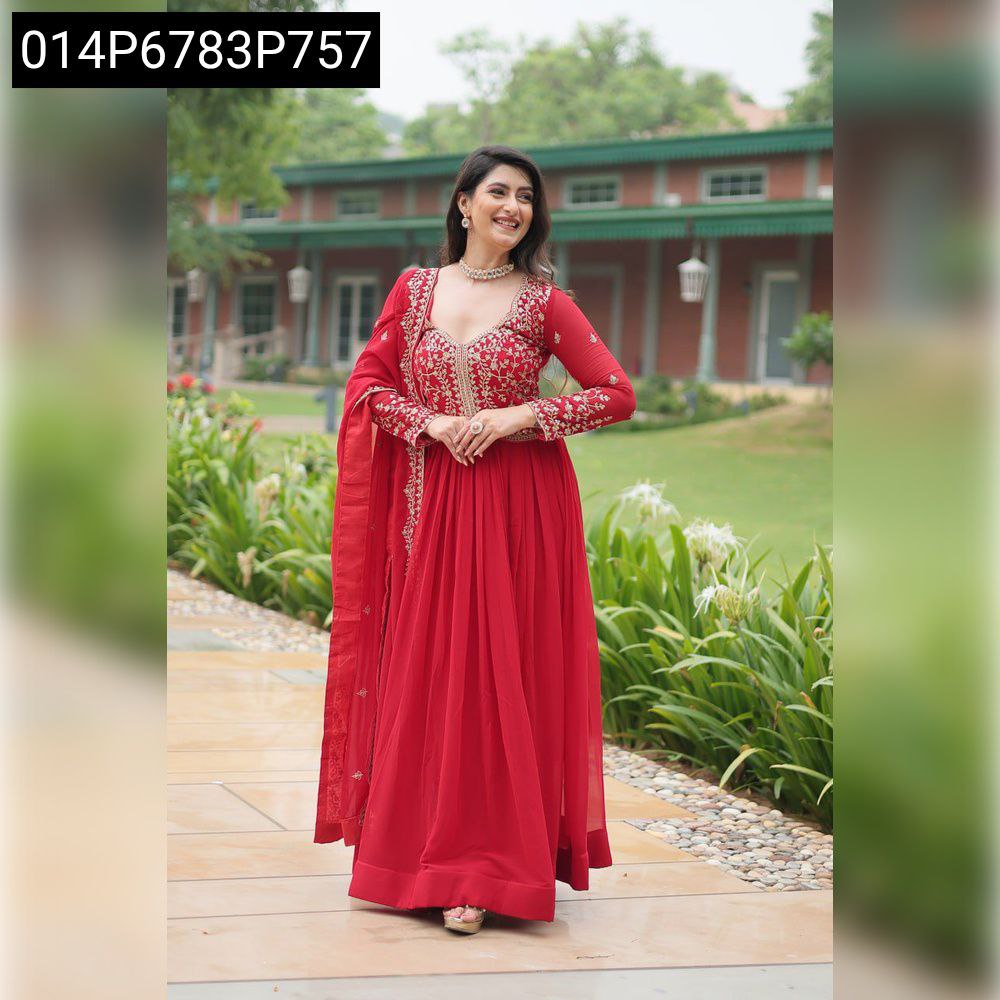 Full shot of woman in Red Faux Georgette embroidered gown with dupatta, smiling outdoors