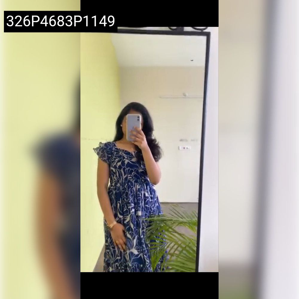Model in blue floral Fox Georgette maxi dress, mirror selfie.