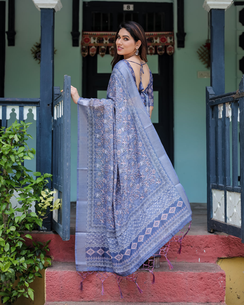 Close-up of the modern white zigzag border on a deep blue linen fabric