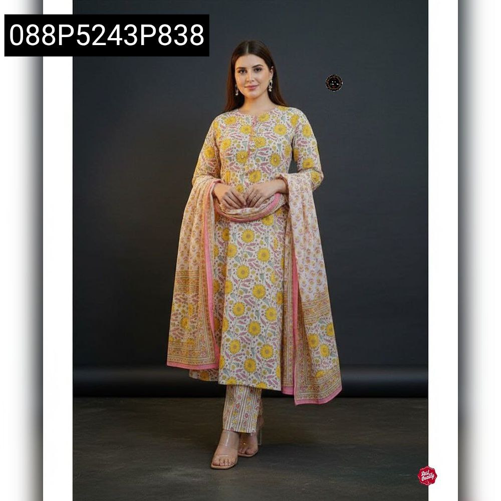 Woman posing in full-length yellow floral print cotton kurti pant dupatta set with heavy handwork